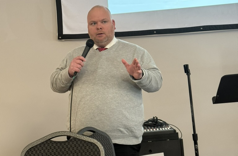 Detective Jason Wallace, Lexington Fayette County Police Department Financial Crimes Unit presenting information on financial crimes.